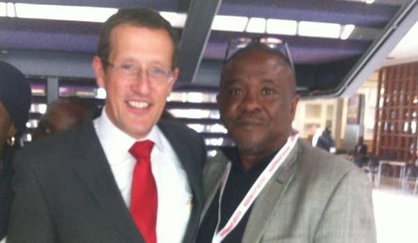 Richard Quest of CNN with the President of CAN Sayina Riman in Amsterdam